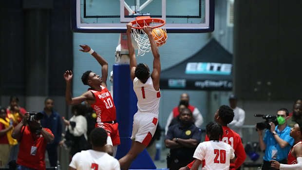 Yazoo City's Tamarion Hoover (1) throws down a dunk against Provine in the Indians' MHSAA State Basketball Tournament win on Feb. 27 at the Mississippi Coliseum.